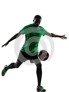 African man soccer player kicking silhouette