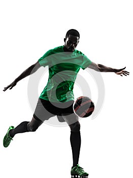 African man soccer player kicking silhouette photo