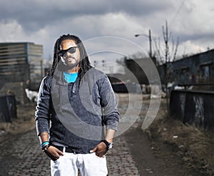 African man in urban portrait.