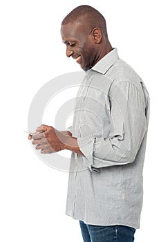 African man using his mobile phone