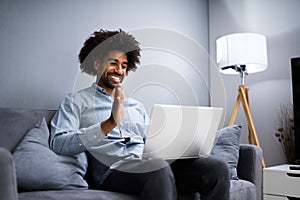 African Man Video Recording On Laptop