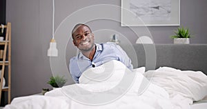 African Man Wakeup After Sleeping photo