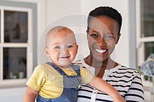 African nanny with baby boy photo