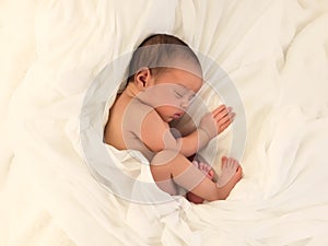 African newborn baby asleep