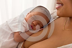 African newborn baby on Mom's chest