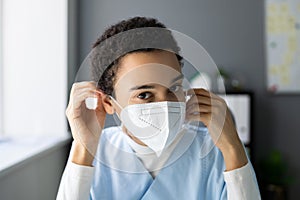 African Nurse Or Doctor Wearing FFP2 Mask photo