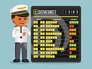 African pilot with departure schedule board