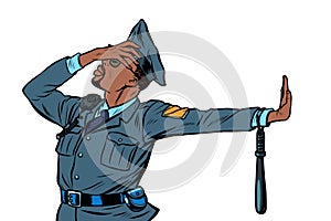 African Police officer. Gesture of denial, shame