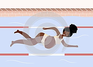 African pregnant woman in bikini in pool. Aqua fitness and aerobic. Healthy lifestyle. Young mother swimming in water