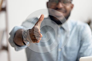 African professional businessman recruiter consultant extending hand at camera