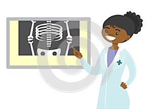 African radiologist doctor examining radiograph.