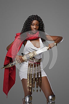 African roman woman warrior with wavy hairs and gladius