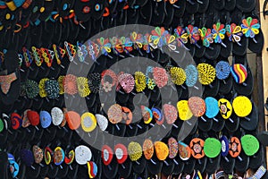 African sandals displayed in a shop along a street in Accra, Ghana