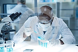 Scientist examining analysis at laboratory