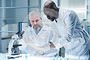 Team of scientists working in laboratory