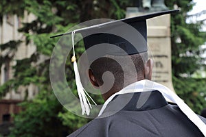 African student in the form of a university graduate from behin
