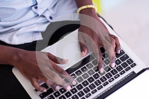 African student using laptop computer