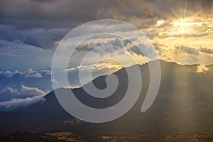 African sunset. Dramatic view of sunset over slopes of Bale mountains covered in Harenna forest, Ethiopia, Africa.