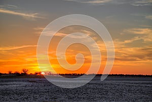 African sunset over pan