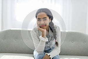 African Teen Girl Sit On Couch At Home