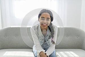 African Teen Girl Sit On Couch At Home