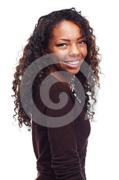 African teen, happy girl and portrait with confidence in studio with casual fashion and beauty. White background, young