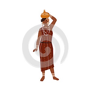 African tribal woman carrying vase or pitcher on head. Young female member of aboriginal tribe wearing ethnic clothes