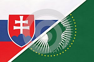 African Union and Slovakia, national flag from textile. Africa continent vs Slovak symbol