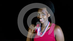 African Woman Athlete With Sports Medal Isolated