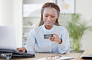 African woman, credit card and laptop in office with typing, click and easy payment with online shopping. Employee