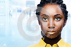 African woman with facial recognition scan on face.