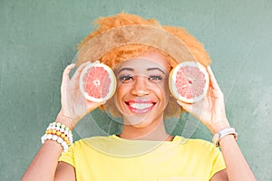 African woman with grapefruit