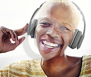 African Woman Headphones Listening Music Concept