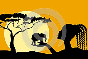 African woman holds elephant in her hand. Black silhouette on the background of sunset in Africa.Wildlife protection concept