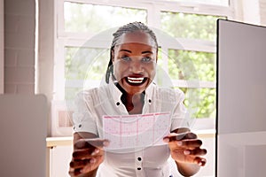 African Woman Kissing Gamble Ticket