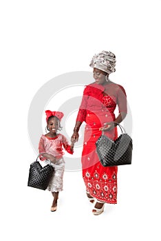 African woman and little girl with tote bags.Isolated