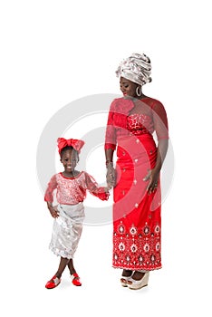 African woman with little girl in traditional clothing.Isolated