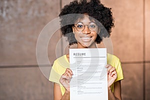 African woman with resume