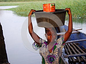 African woman at the river