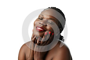 African woman& x27;s flawless skin evokes sense of purity, self care and wellness. African smiling woman isolated on