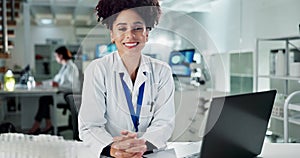 African woman, scientist and laptop in laboratory with face for innovation, pharma research and smile. Person, lab and