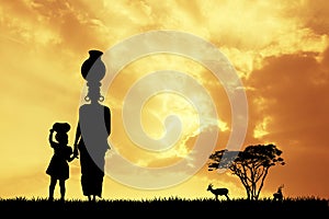 African woman at sunset