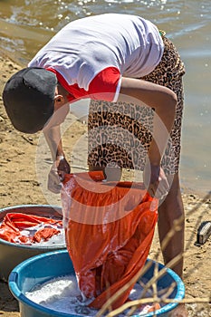 Woman washing clothes