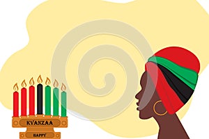 African woman wearing a traditional headdress and candlestick with 7 candles in national colors