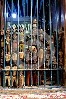 African wood carved dolls in shop window in Stone Town Zanzibar