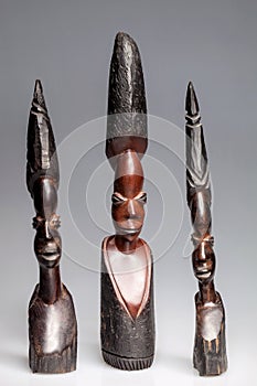 African wooden statuettes of women