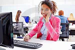 African young businesswoman working in office