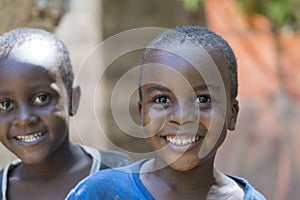 African young children on a street of Zanzibar island, Tanzania, East Africa