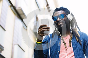 African Young Man Listening Music.