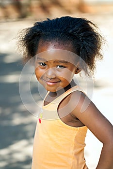 African youngster outdoors.